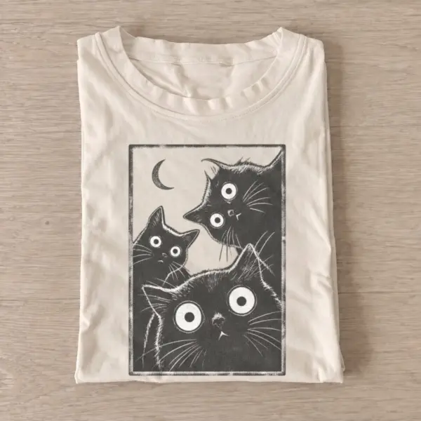 Wide eyed cat trio graphic t shirt sand20wide eyed cat trio.webp
