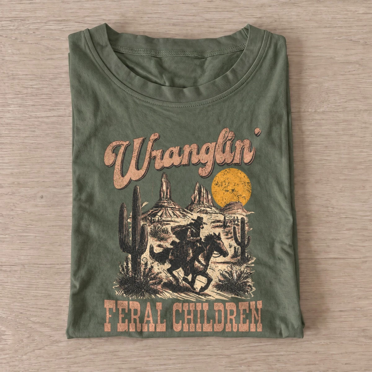Wranglin feral children t shirt olive20wrangling feral children.webp
