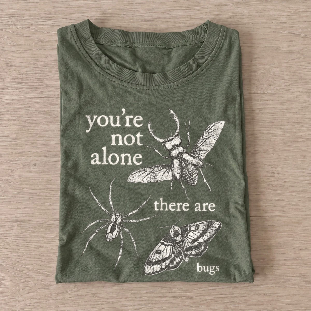 Youre not alone there are bugs t shirt olive20never alone bugs.webp
