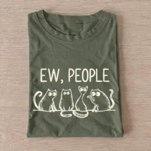 Olive Ew People Cat Squad T-shirt with three wide-eyed cats beneath EW, PEOPLE lettering