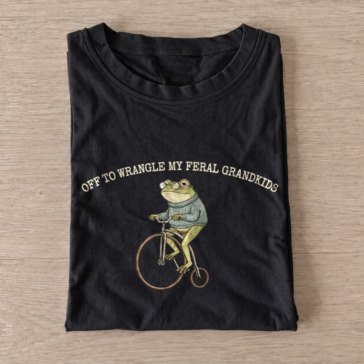 Off to wrangle my feral grandkids frog t shirt black20feral grandkids.webp