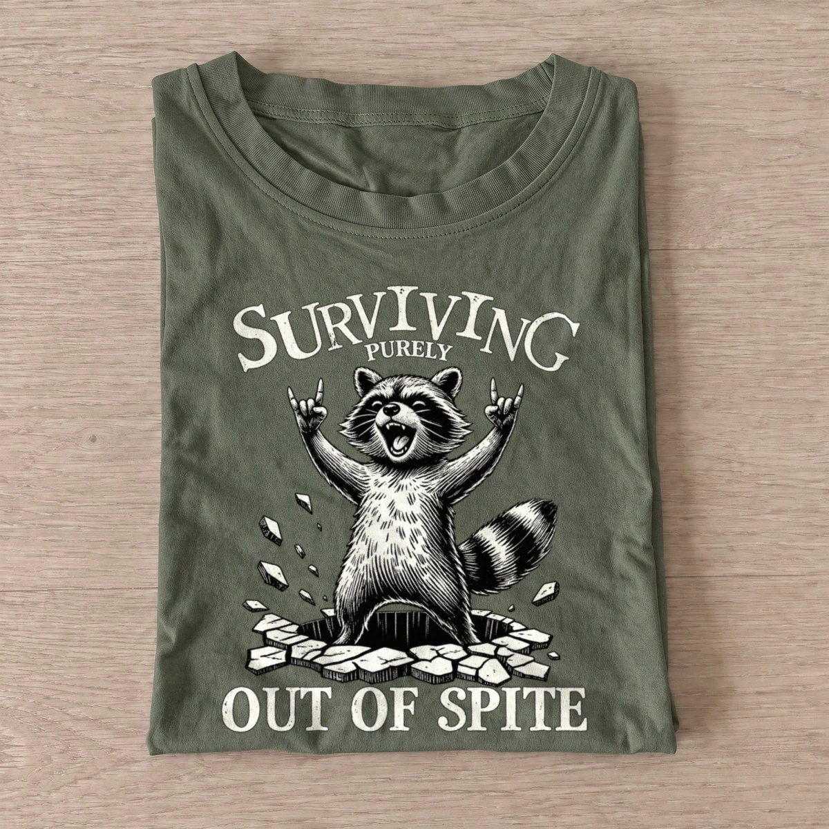 Surviving purely out of spite raccoon t shirt olive20surviving out of spite.webp