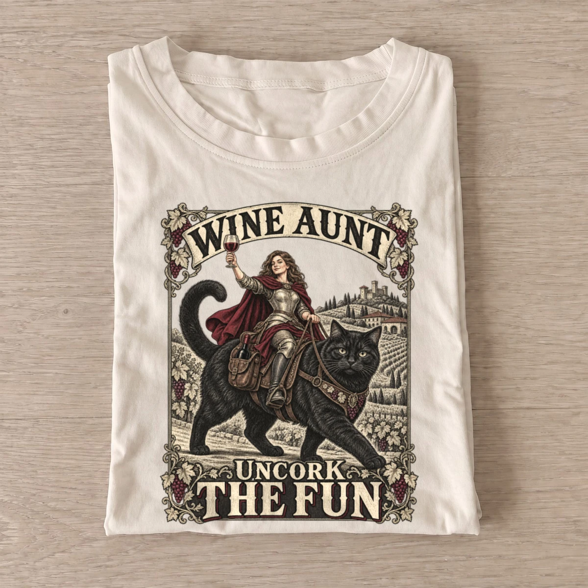 Wine aunt uncork the fun cat rider t shirt sand20wine aunt cat rider.webp